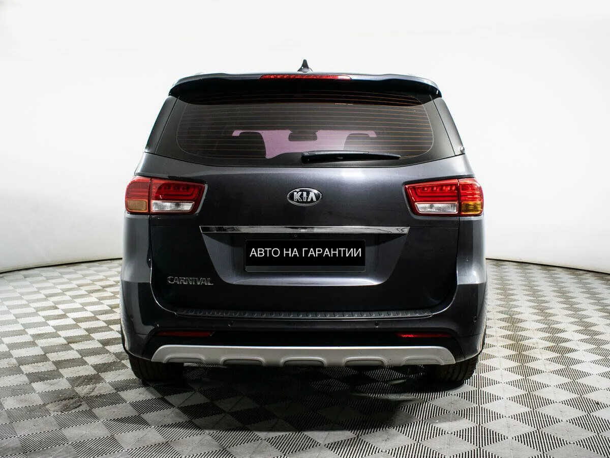 Kia Carnival III — фото 4