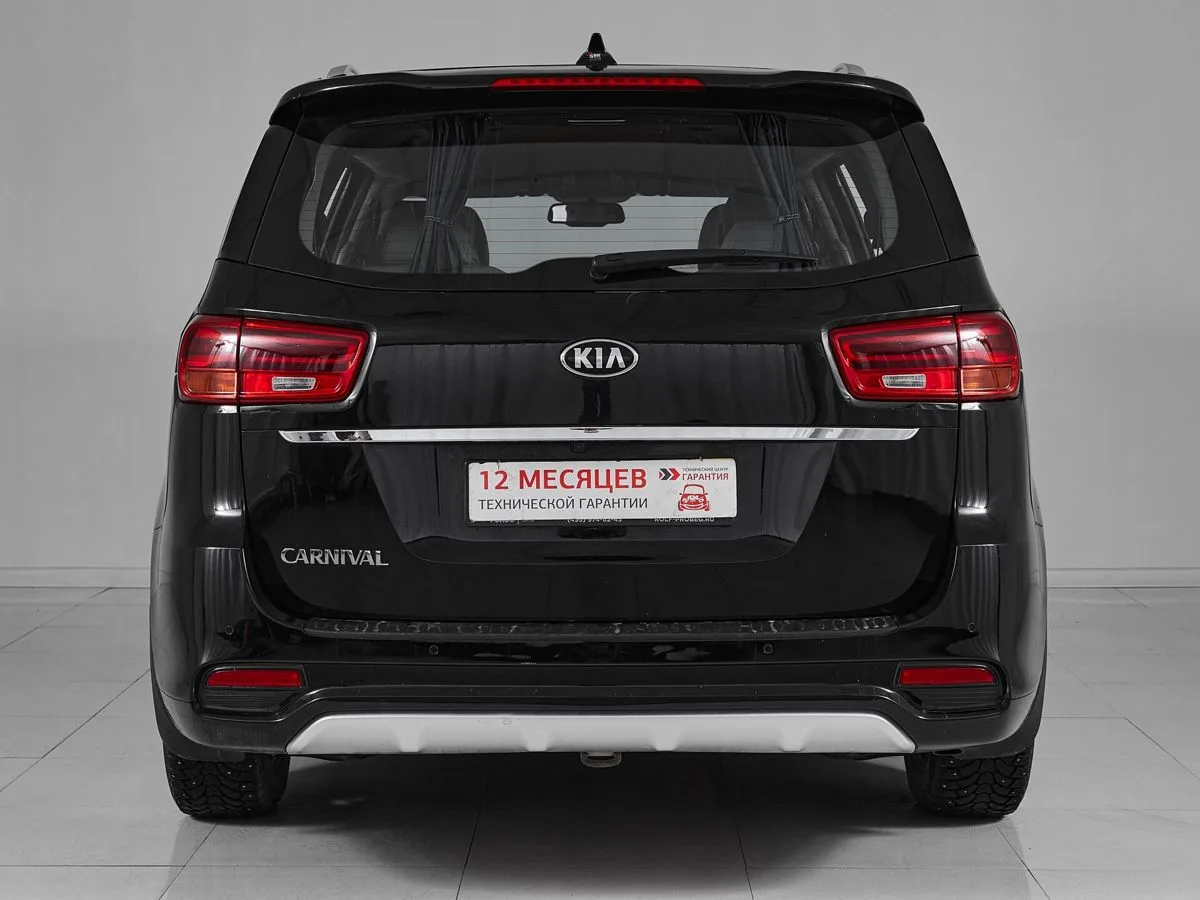 Kia Carnival III — фото 5