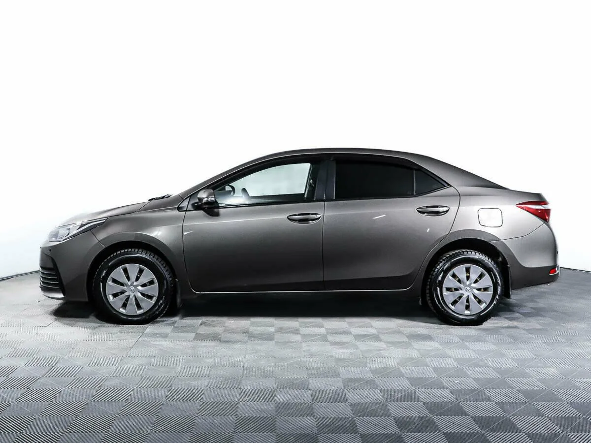 Toyota Corolla XI (E160, E170, E180) Рестайлинг 1 · Стиль Плюс — фото 3
