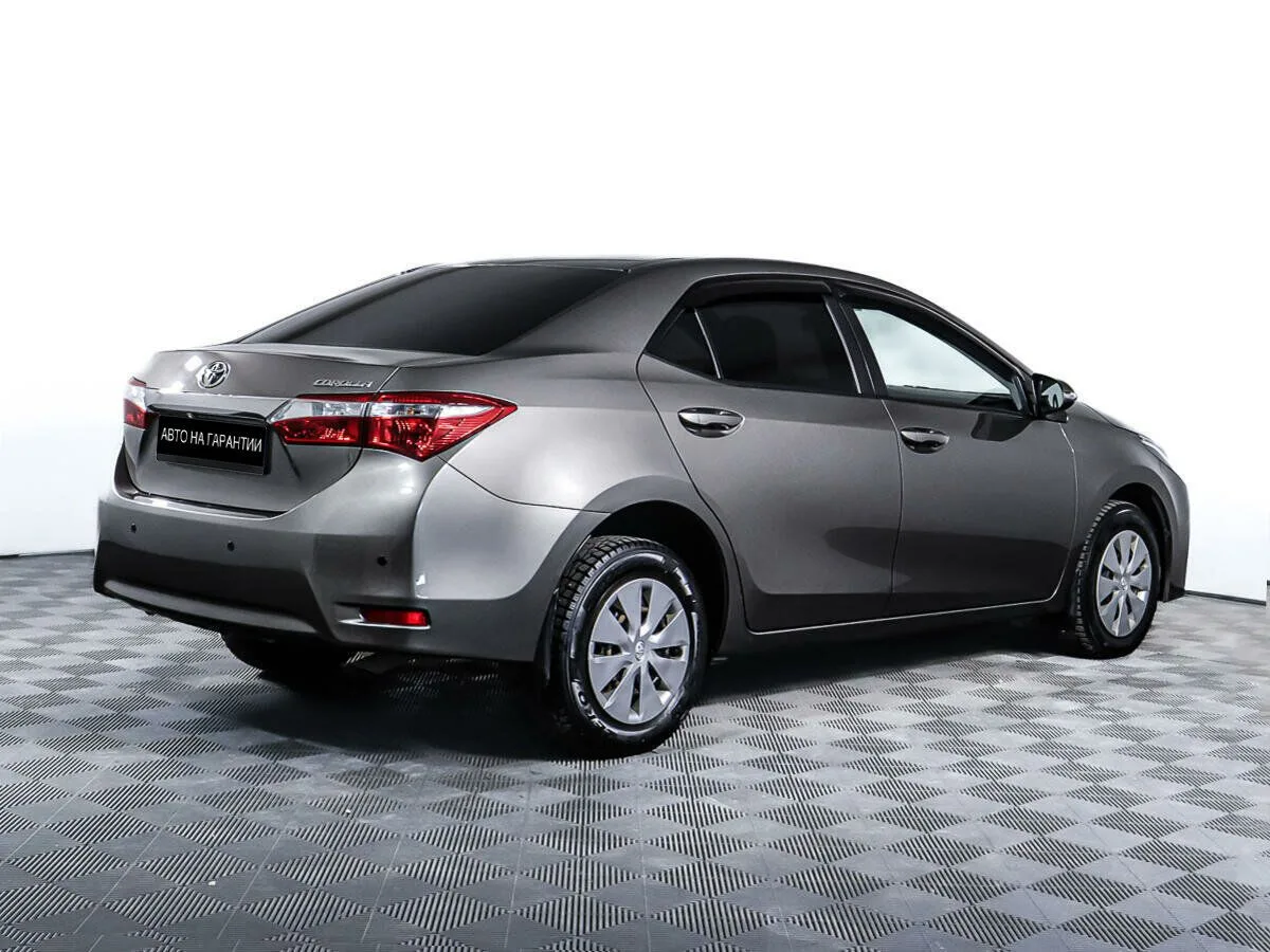 Toyota Corolla XI (E160, E170, E180) Рестайлинг 1 · Стиль Плюс — фото 5