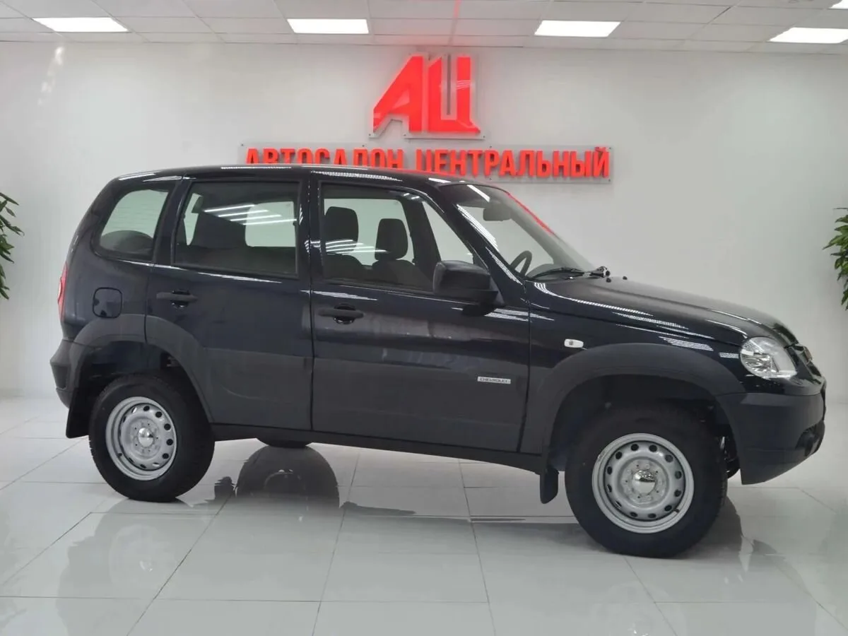 Chevrolet Niva I Рестайлинг · L — фото 3