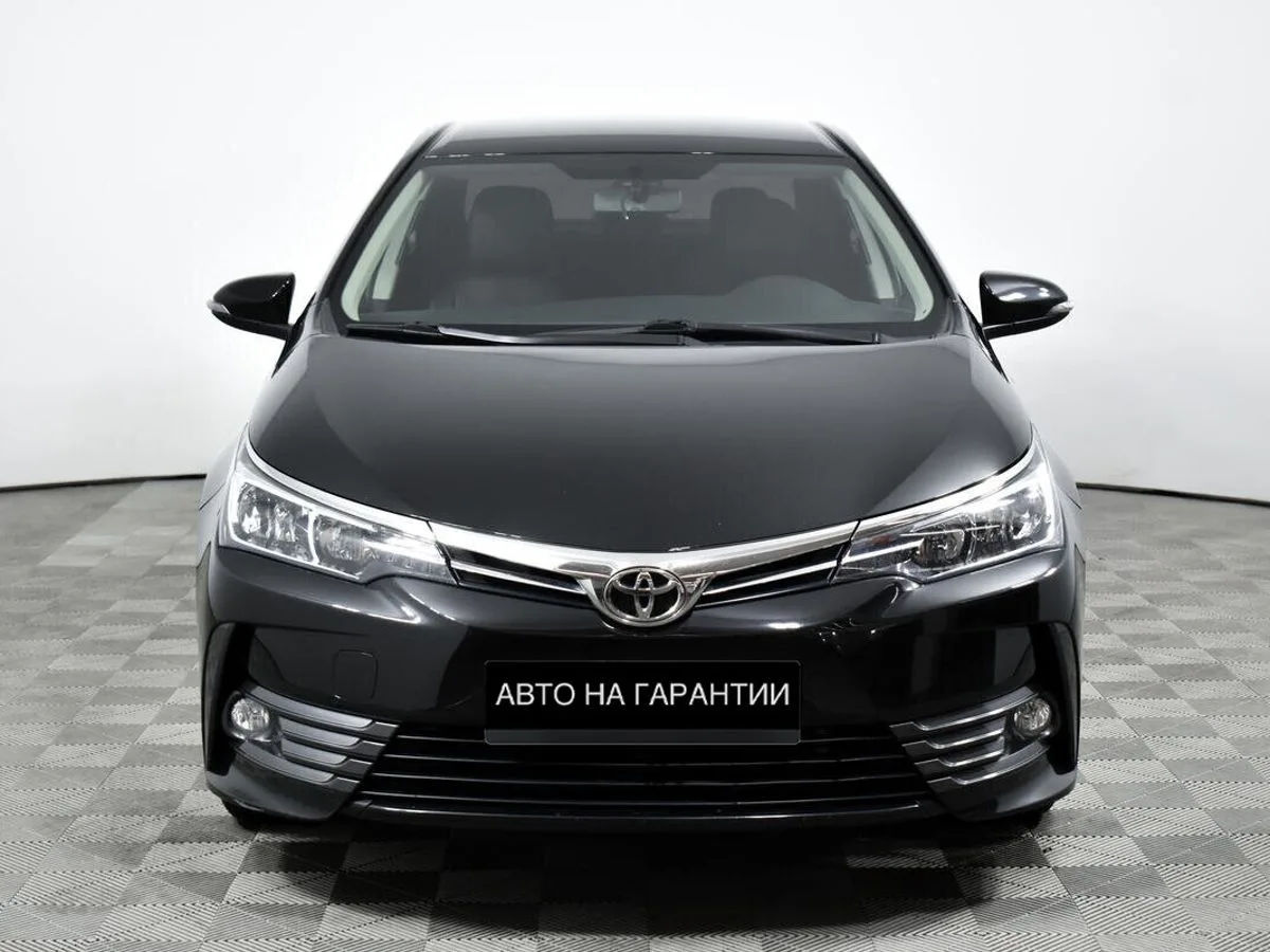 Toyota Corolla XI (E160, E170, E180) Рестайлинг 1 · Комфорт — фото 2