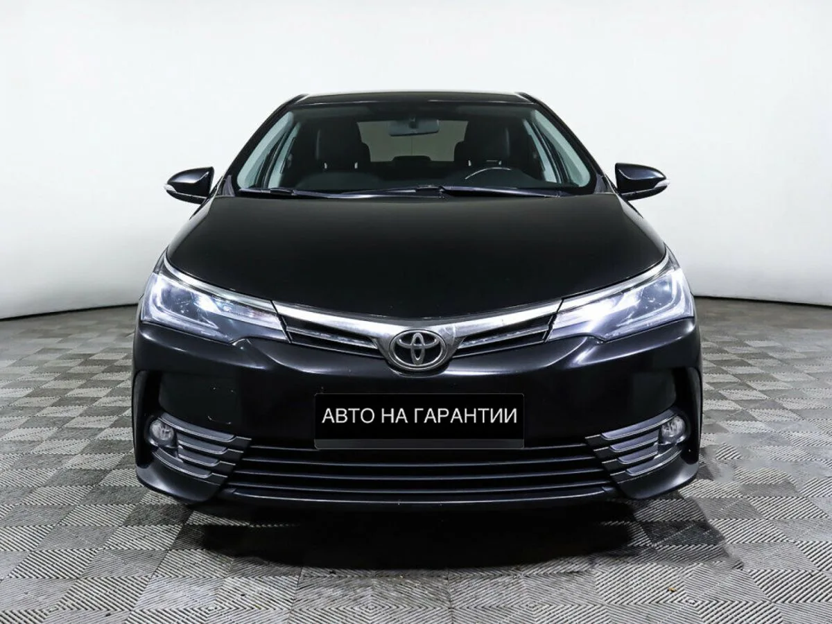 Toyota Corolla XI (E160, E170, E180) Рестайлинг 1 · Стиль — фото 2