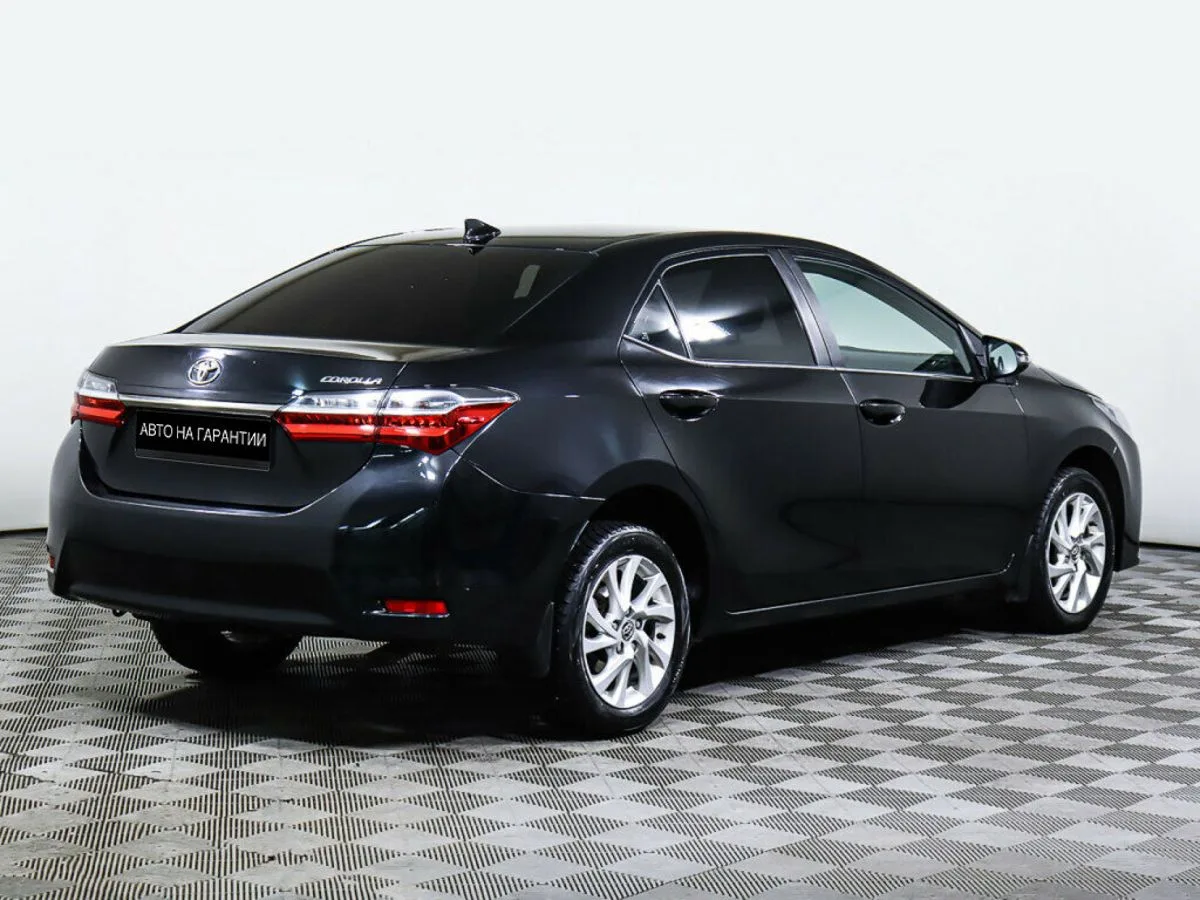 Toyota Corolla XI (E160, E170, E180) Рестайлинг 1 · Стиль — фото 5
