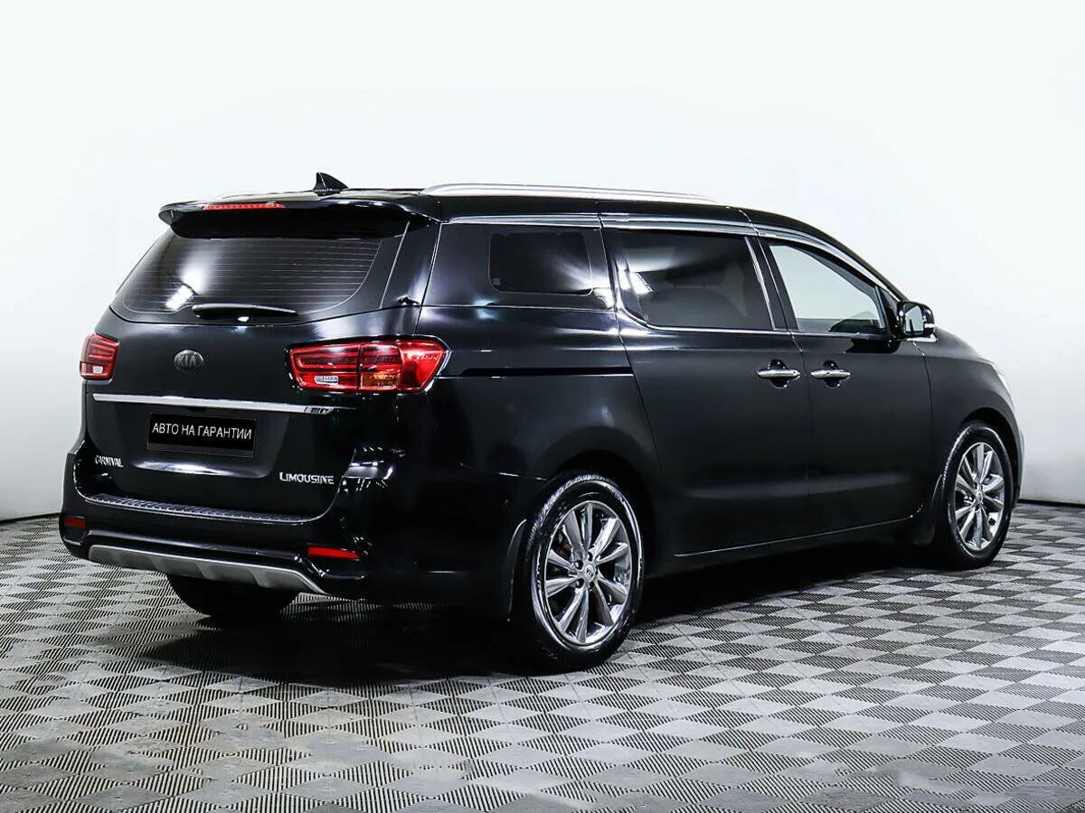 Kia Carnival III — фото 5