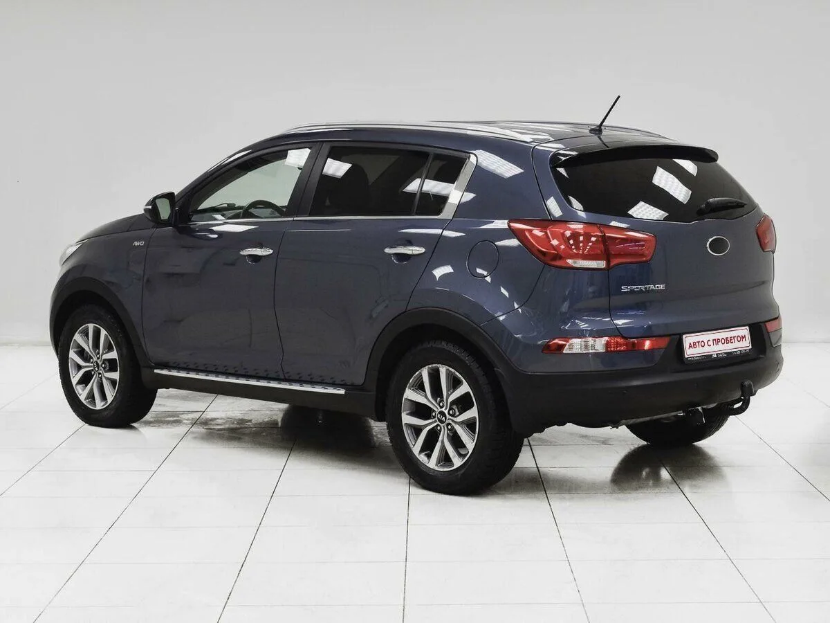 Kia Sportage III Рестайлинг — фото 2