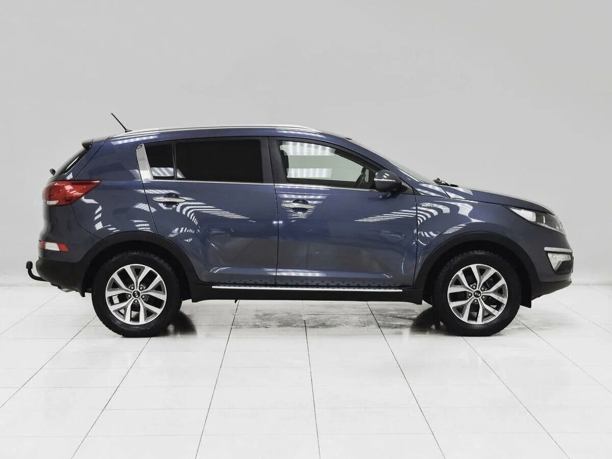 Kia Sportage III Рестайлинг — фото 5