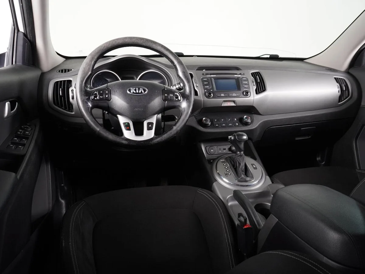Kia Sportage III Рестайлинг — фото 5