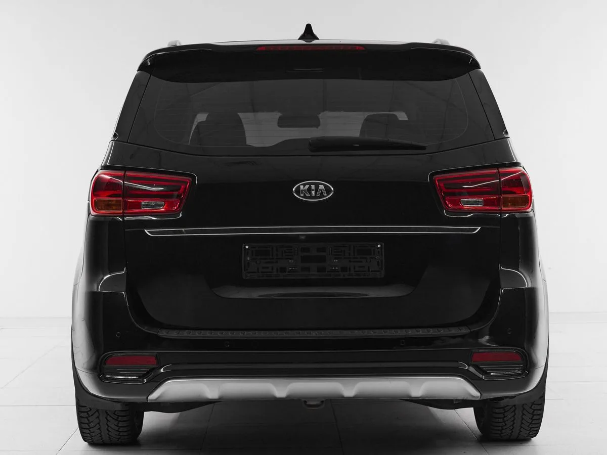 Kia Carnival III — фото 5