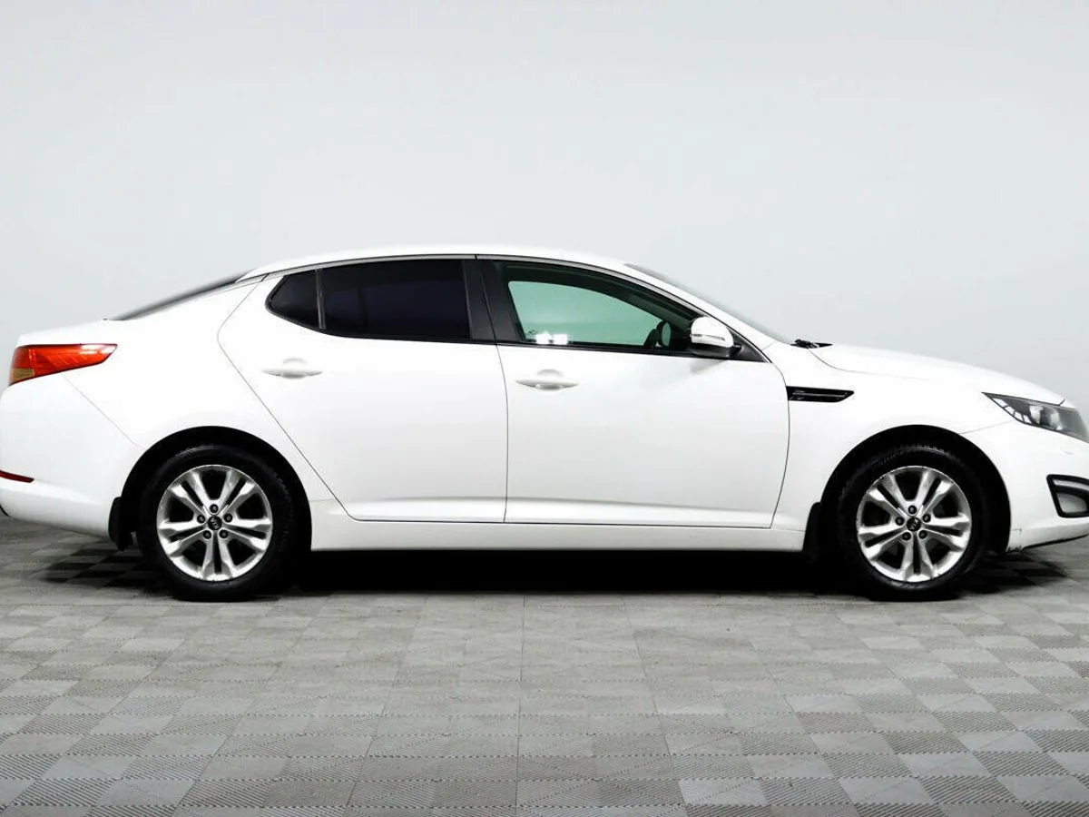 Kia Optima III · Prestige — фото 4