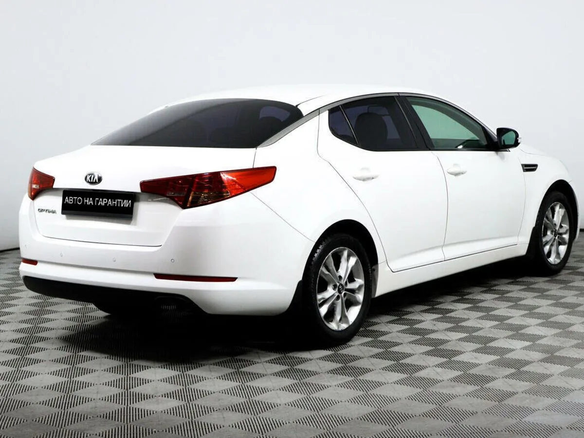 Kia Optima III · Prestige — фото 5