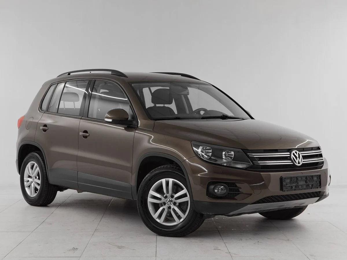 Volkswagen Tiguan I Рестайлинг · Avenue — фото 3