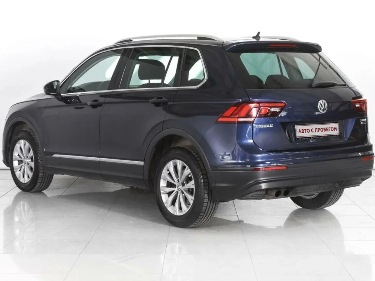 Volkswagen Tiguan II · Highline — фото 2