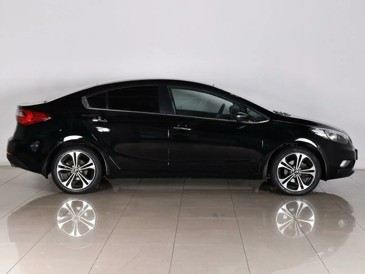 Kia Cerato III — фото 5