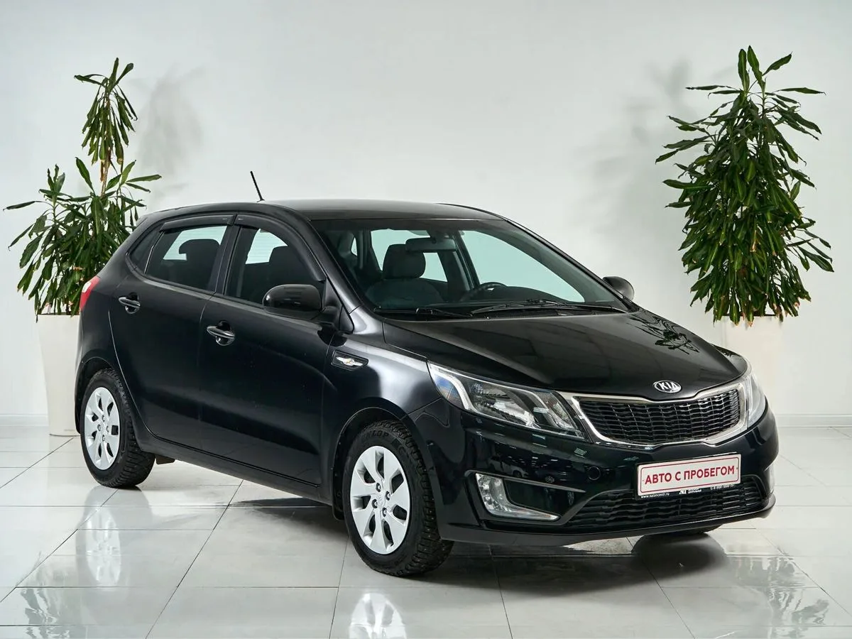 Kia Rio III — фото 3