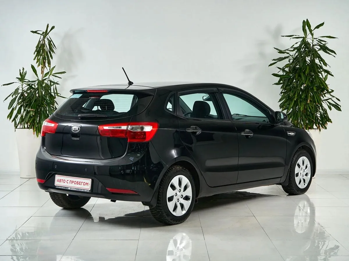 Kia Rio III — фото 4