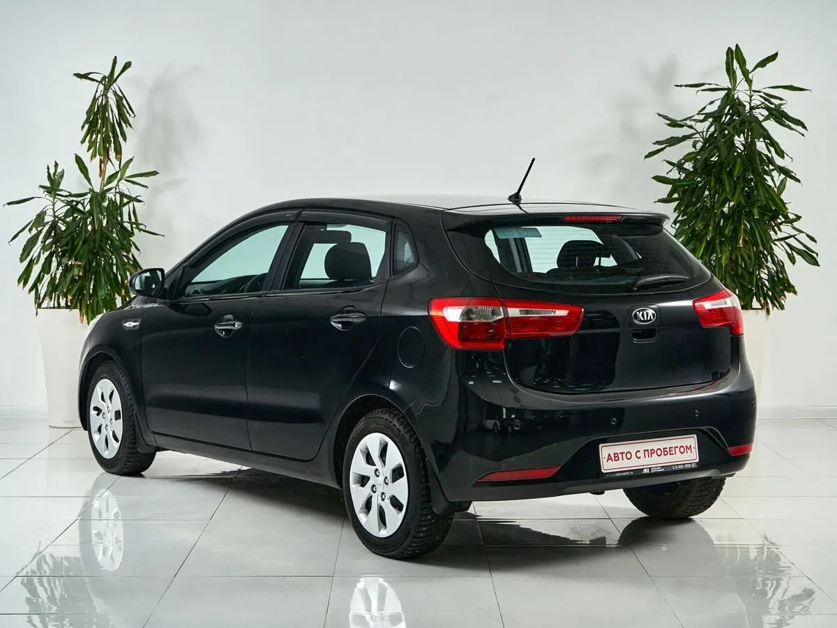 Kia Rio III — фото 5