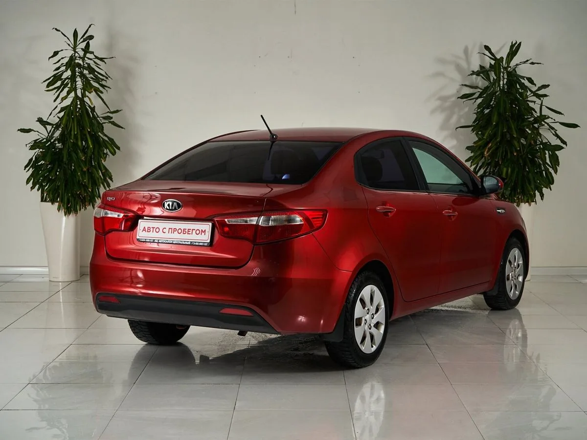 Kia Rio III — фото 5
