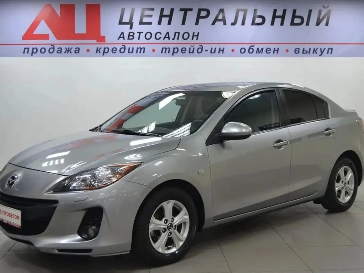Mazda 3 II (BL) Рестайлинг · Touring Plus