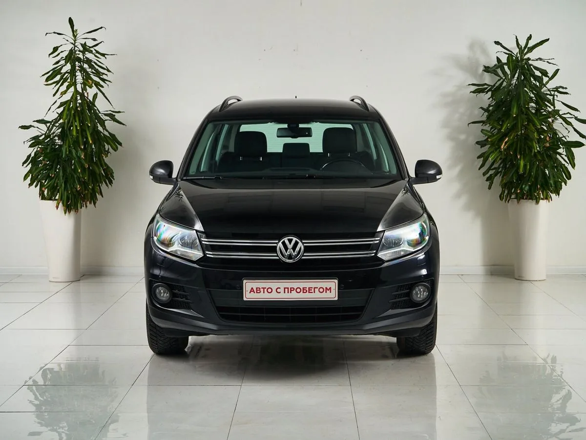 Volkswagen Tiguan I Рестайлинг · Adventure — фото 2