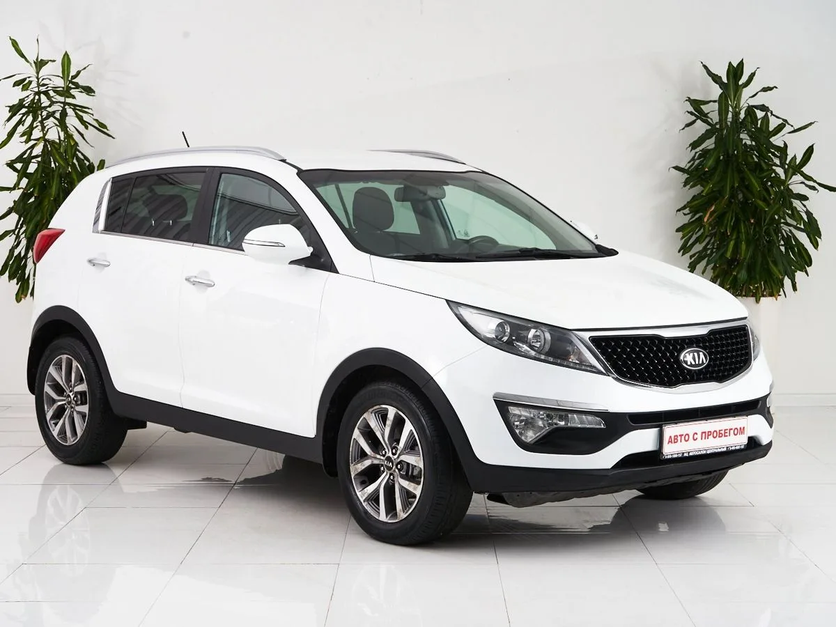 Kia Sportage III Рестайлинг — фото 3