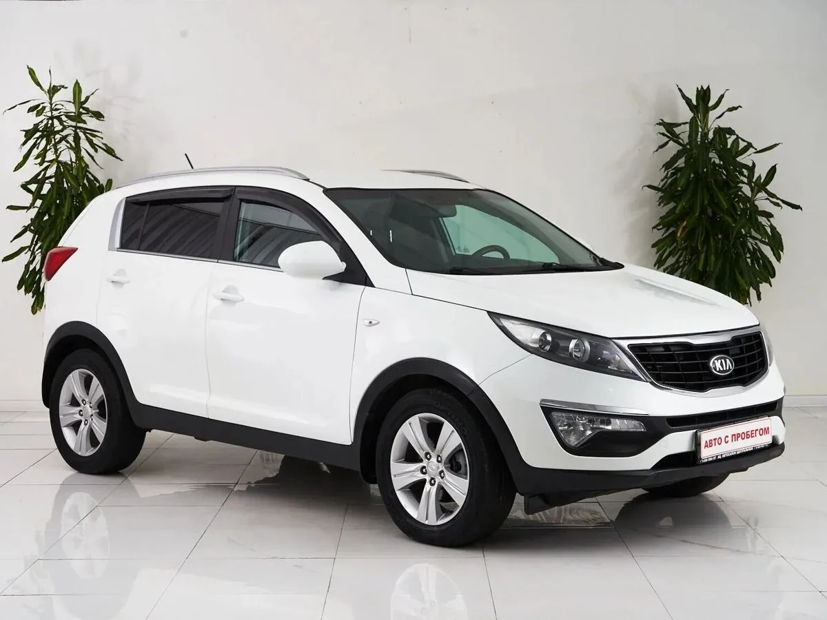 Kia Sportage III Рестайлинг · Classic +обогрев — фото 3