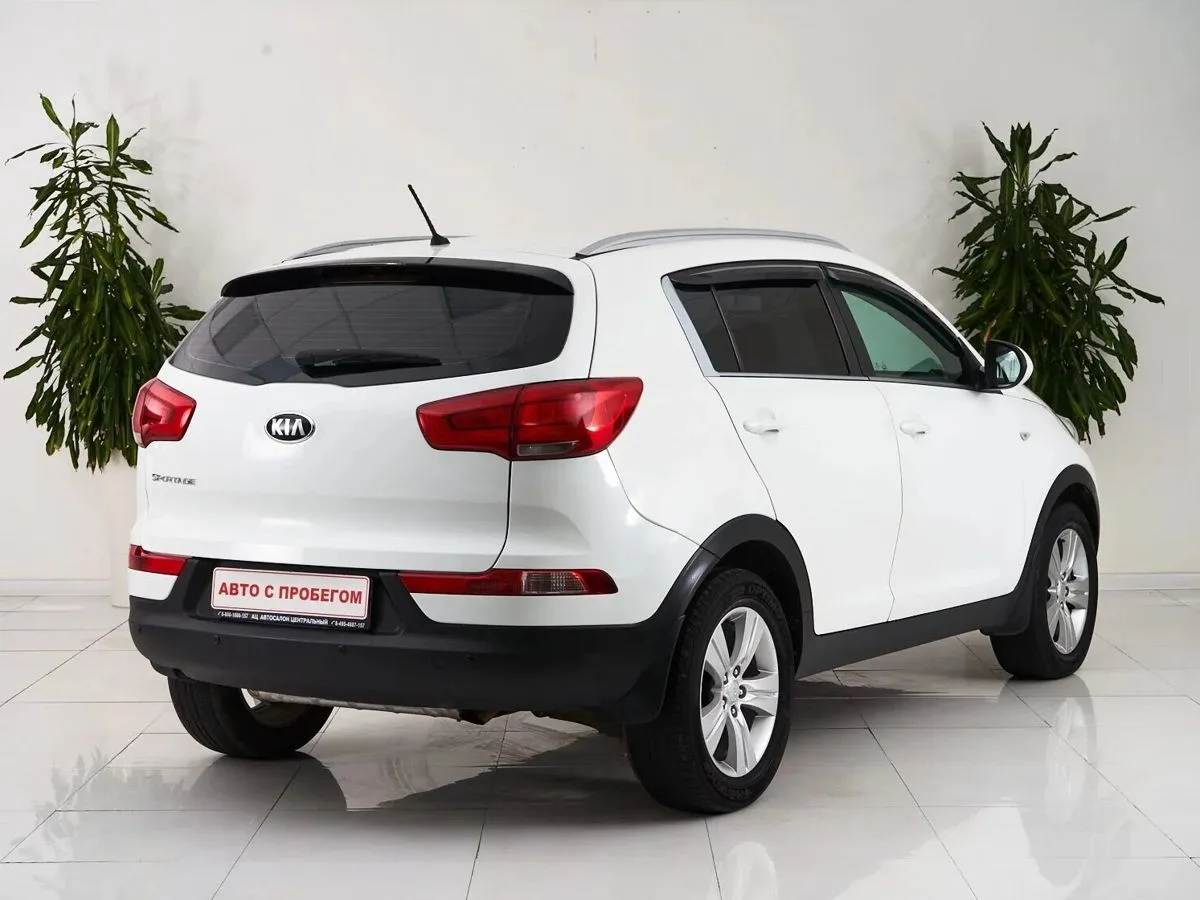 Kia Sportage III Рестайлинг · Classic +обогрев — фото 5