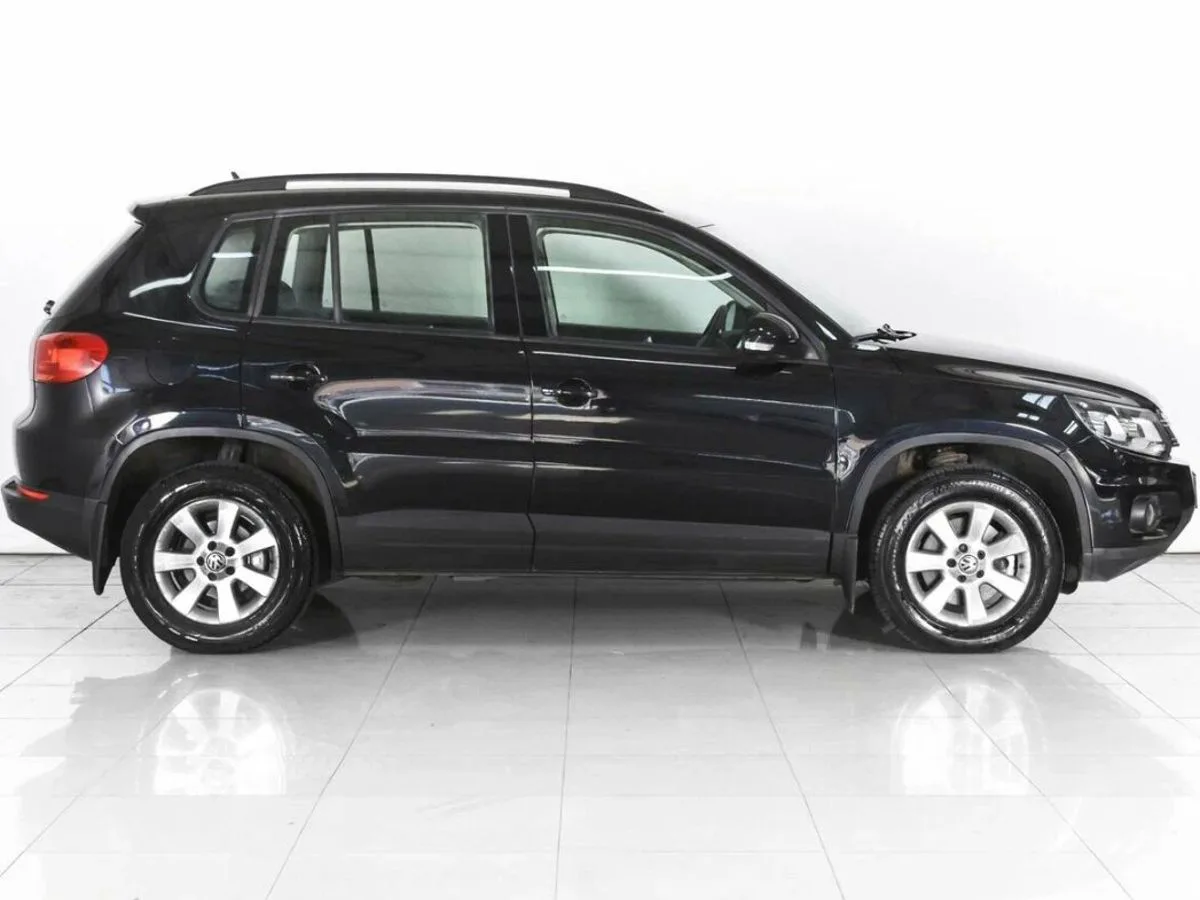 Volkswagen Tiguan I Рестайлинг · Avenue — фото 5