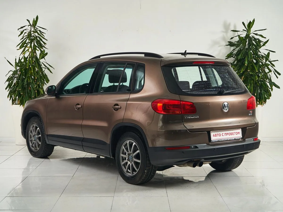 Volkswagen Tiguan I Рестайлинг · Adventure — фото 4
