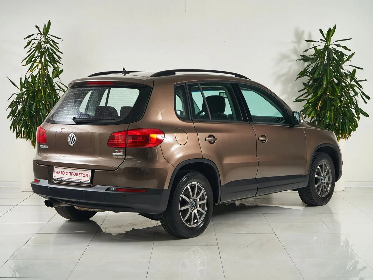 Volkswagen Tiguan I Рестайлинг · Adventure — фото 5