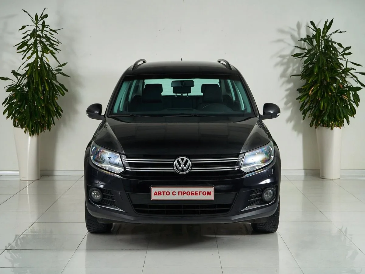 Volkswagen Tiguan I Рестайлинг · Adventure — фото 2