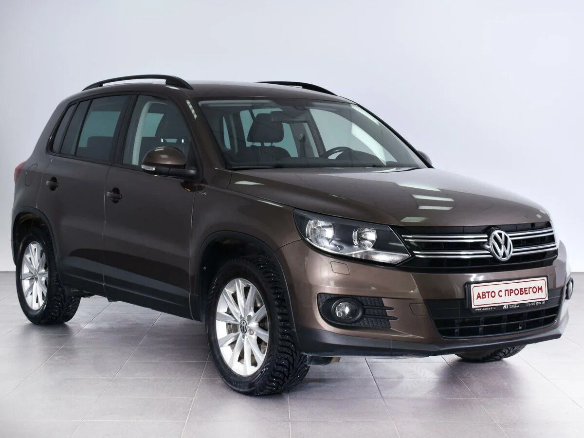 Volkswagen Tiguan I Рестайлинг · Adventure