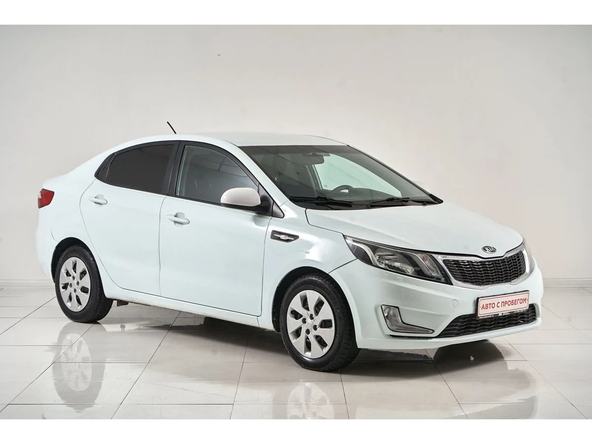 Kia Rio III — фото 3