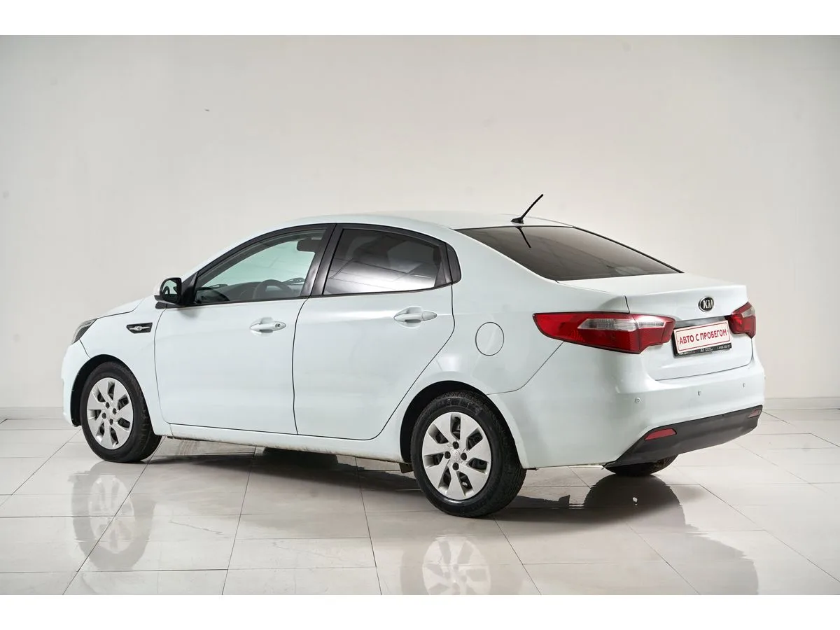Kia Rio III — фото 4