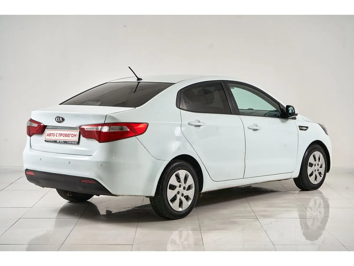 Kia Rio III — фото 5